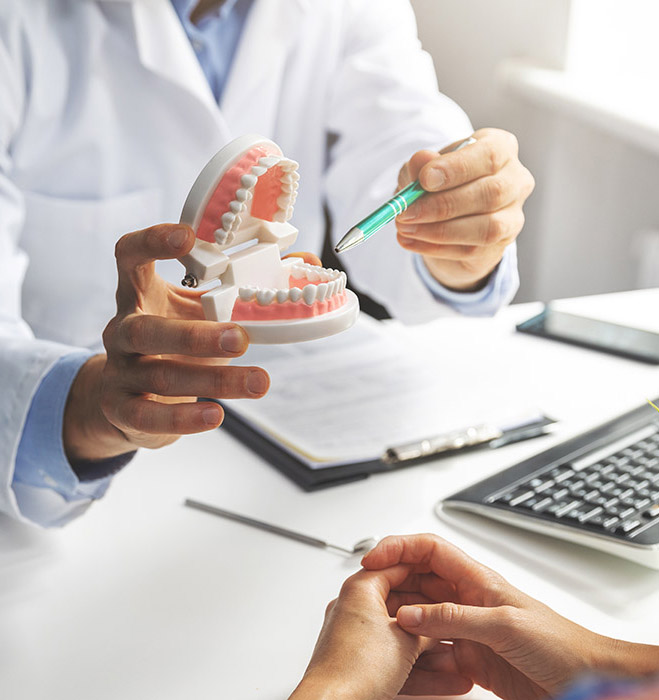 I Love My Dentist | dentist instructing patient